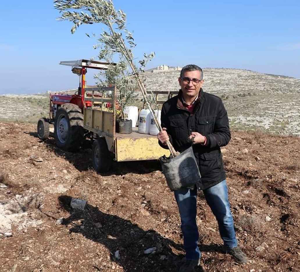 Mohammed with olive sapling