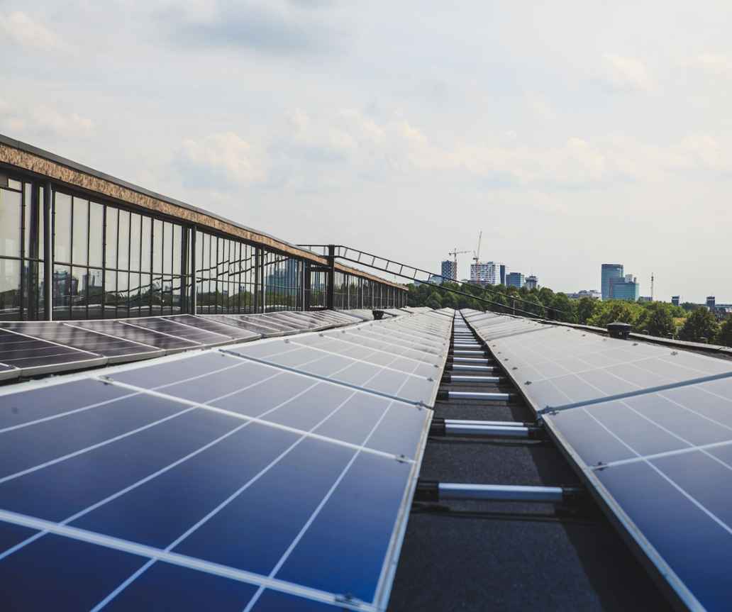 Rooftop solar panels and cityscape