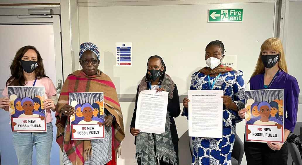 Rosamund and other mothers at COP26 just before they presented an open letter to COP26 President Alok Sharma