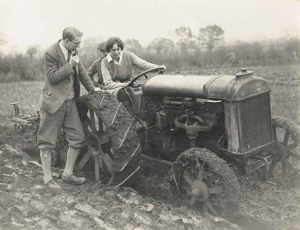 Historic image of lady on a tractor